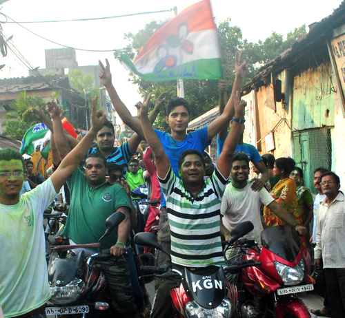 TMC supporters celebrate in front of CM's residence