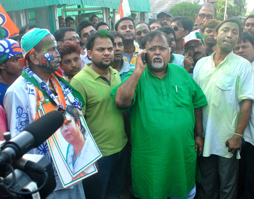TMC supporters celebrate in front of CM's residence