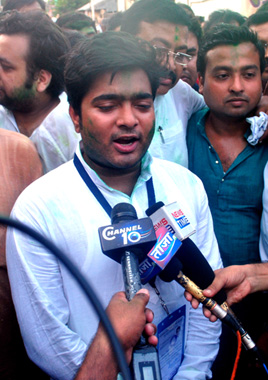 TMC supporters celebrate in front of CM's residence