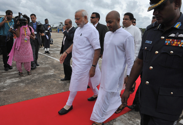  Modi received by the dignitaries, at Anuradhapura helipad, Colombo, in Sri Lanka 