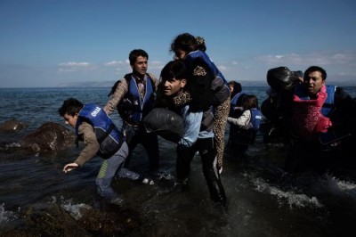 Ban warns against cuts in development aid to finance response to refugee crisis