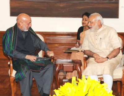 Former Afghan President Hamid Karzai calls on PM