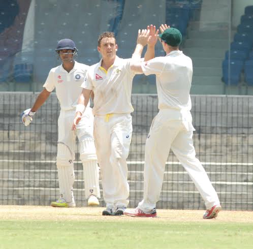 Australia fight back after initial jolts from Ojha