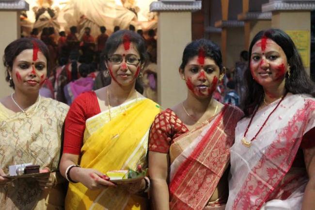 Women smear each other with sindoor on Vijaya Dasami