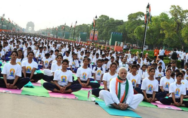 PM Modi leads mass yoga demonstration in Delhi on first International Yoga Day