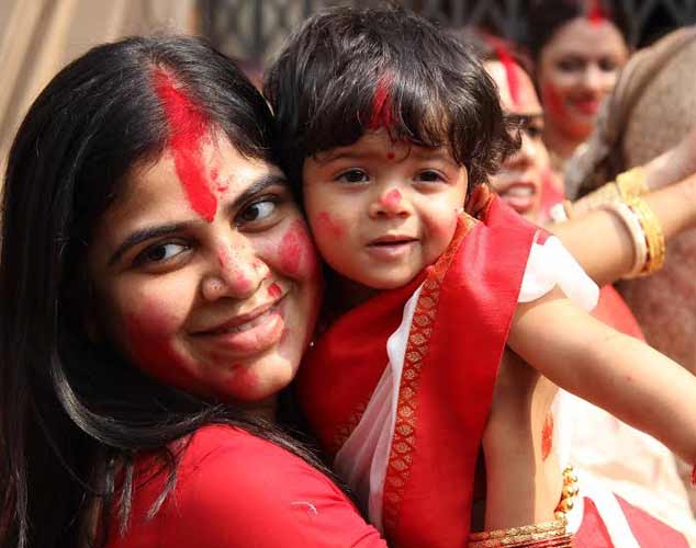Revellers bid adieu to Goddess Durga on Maha Dashami