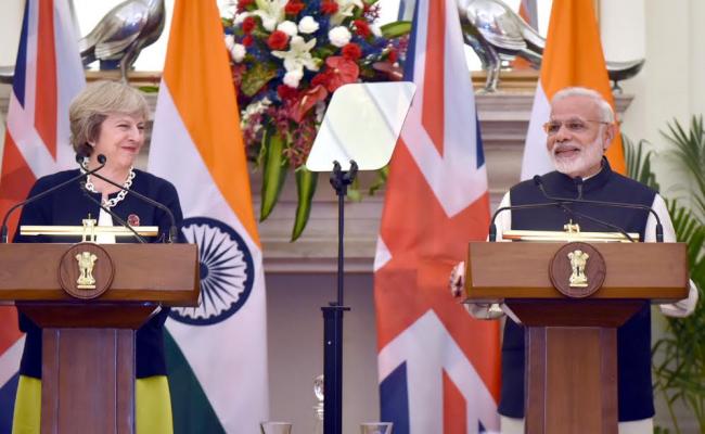 Narendra Modi meeting the Prime Minister of United Kingdom