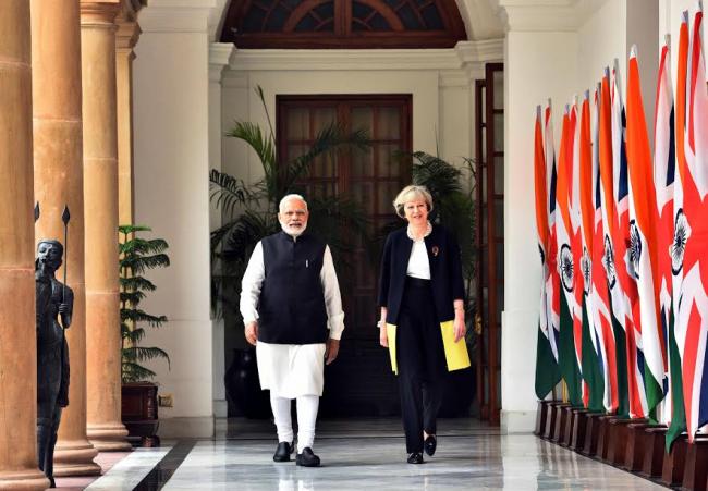 Narendra Modi meeting the Prime Minister of United Kingdom