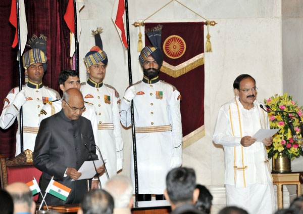 President Kovind administers oath of office to Vice President Naidu