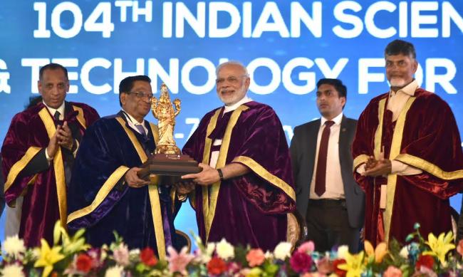 Narendra Modi being welcomed by the Governor of Andhra Pradesh and Telangana