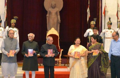 Pranab Mukherjee  receives books â€˜Mann Ki Baat: A Social Revolution on Radioâ€™