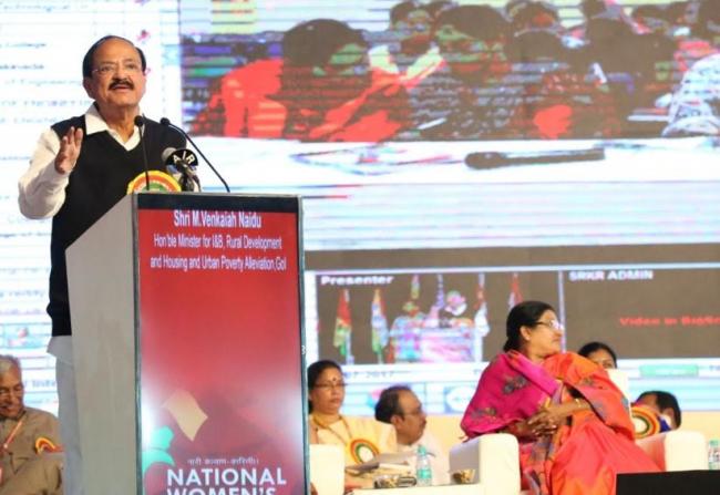  M. Hamid Ansari being presented with the â€˜Flag Stickerâ€™