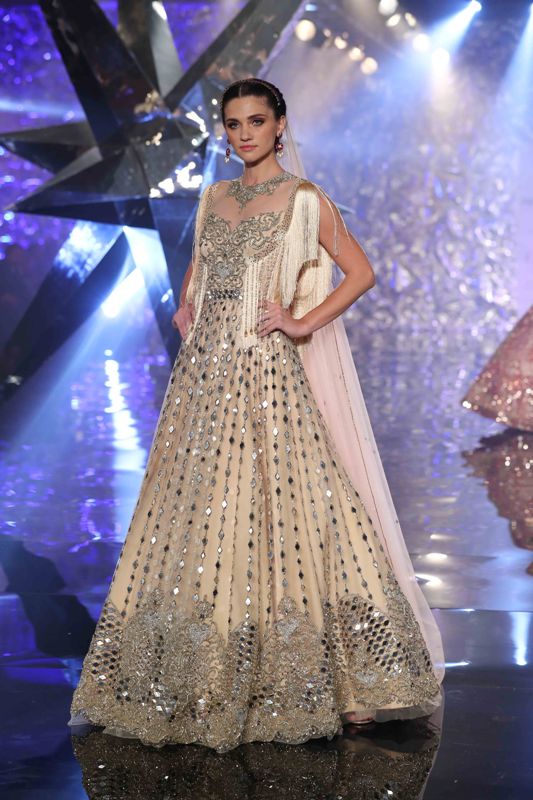 Models walk for Suneet Varma in India Couture Week