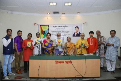 Bibhas Chakraborty launches Rajlakshmi Roy's book Tri Natya Darpane Garhasthya Jiban