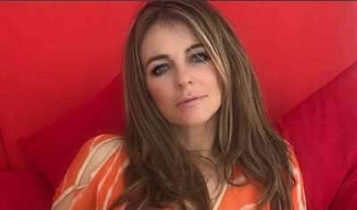 Elizabeth Hurley looks graceful in orange kaftan 