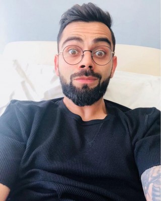 Wearing stylish new specs, Virat Kohli shares cute image on social media 