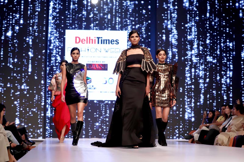 Models walk the ramp at fashion show in New Delhi