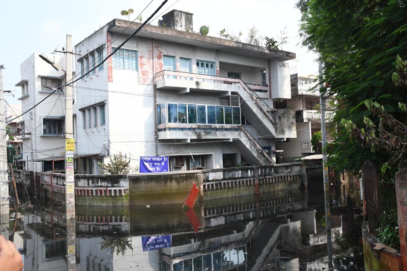 Jan Adhikar Party Chief Pappu Yadav wade through a flooded area