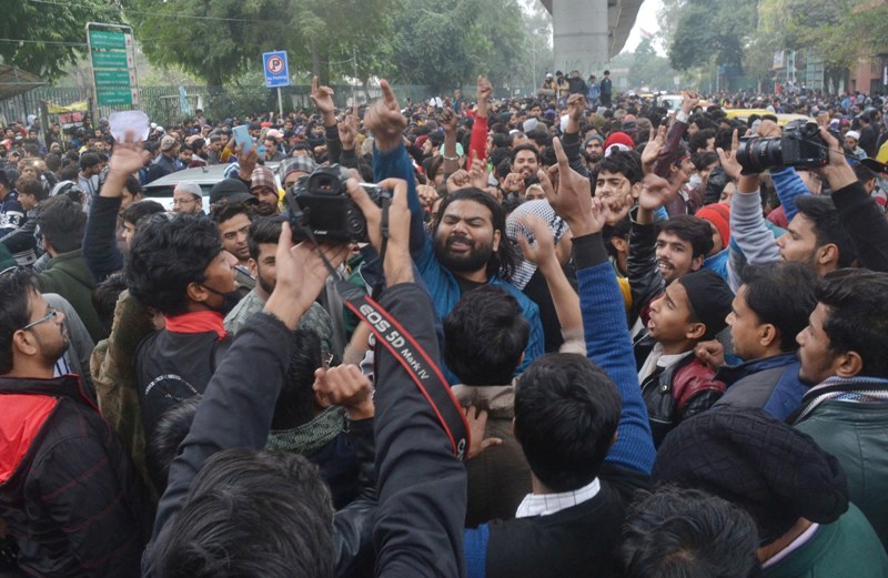 Students agitating against Citizenship Amendment Act  outside Jamia Millia Islamia University.