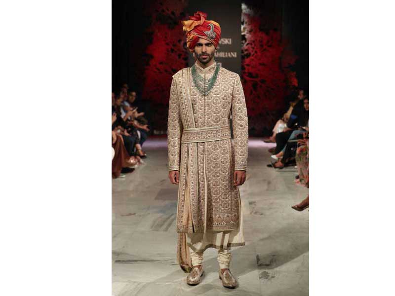 Models walk the ramp for Tarun Tahiliani's show