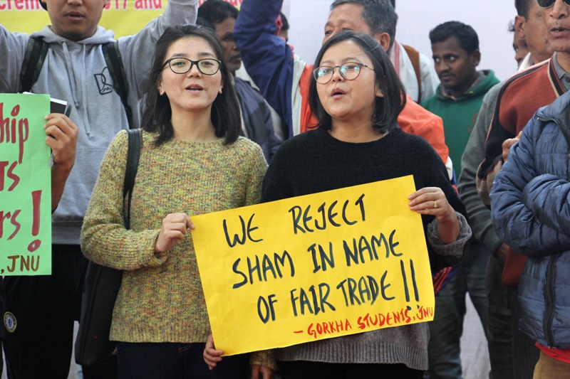 Members of Citizen Against War form human chain for peace