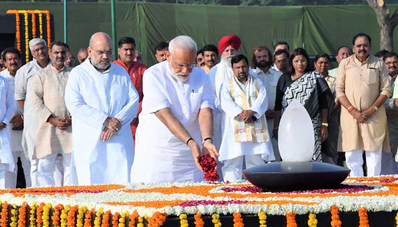 PM Modi pays homage to Mahatma Gandhi at Rajghat