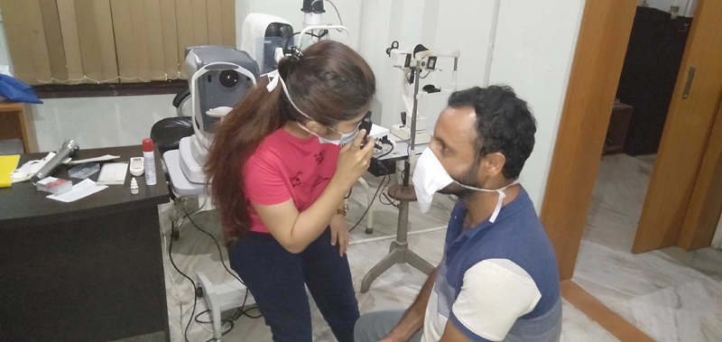 Cornea transplant specialist Dr Ghazal Pushp treating a patient