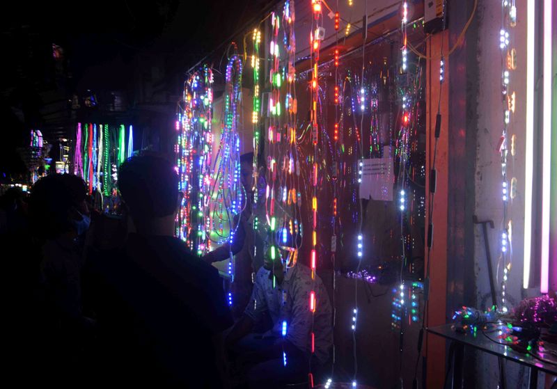 People shopping Diwali lights ditching covid scare