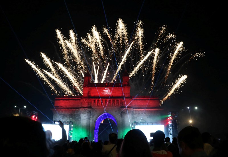 People enjoy light show during New Year celebration in Mumbai