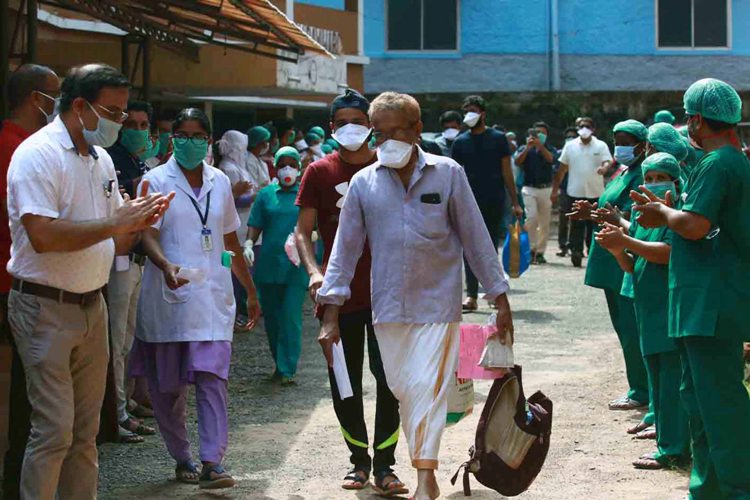 Discharged Covid patients given see-off by hospital staffs in Kannur
