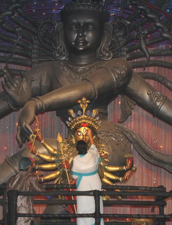 Mamata Banerjee performs Goddess Durga's 'Chokkhudaan' at Kolkata's Chetla Agrani Club