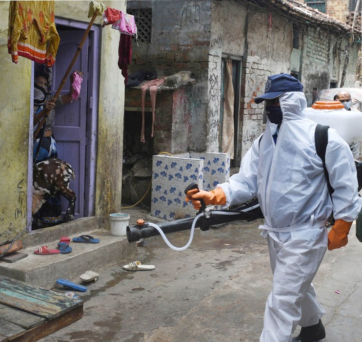People queue up in front of pharmacies in Kolkata