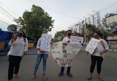 Noble International University partners with local theatre group, paint street graffiti on World Environmental Peace