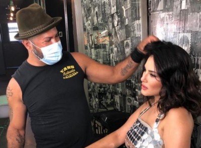 In her latest Instagram post, Sunny Leone is busy with her hair and makeup