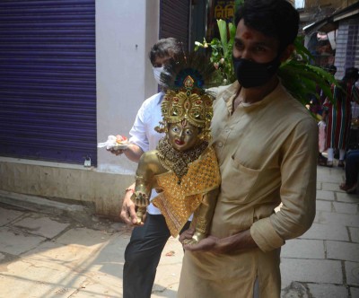 People in Varanasi taking home Laddoo Gopal idols on Janmashtami