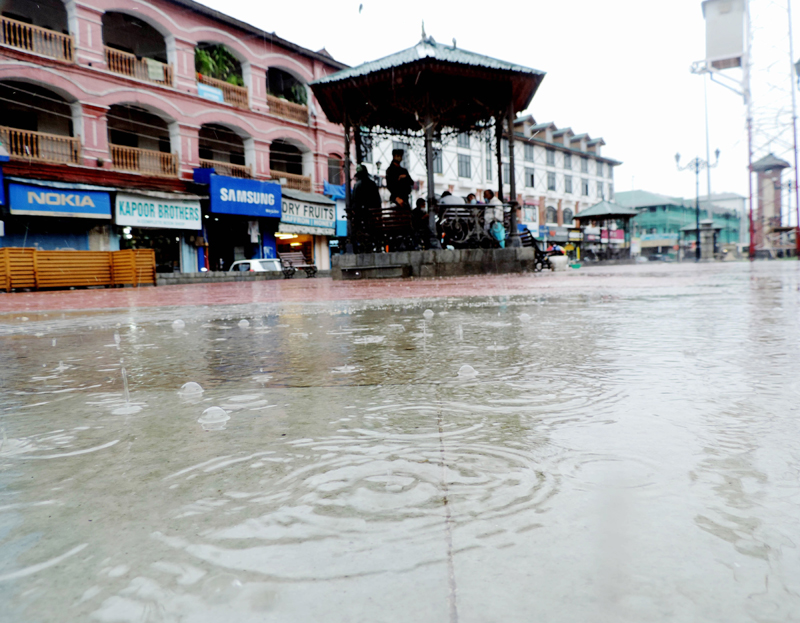 People walking down the Lal Chowk in Srinagar