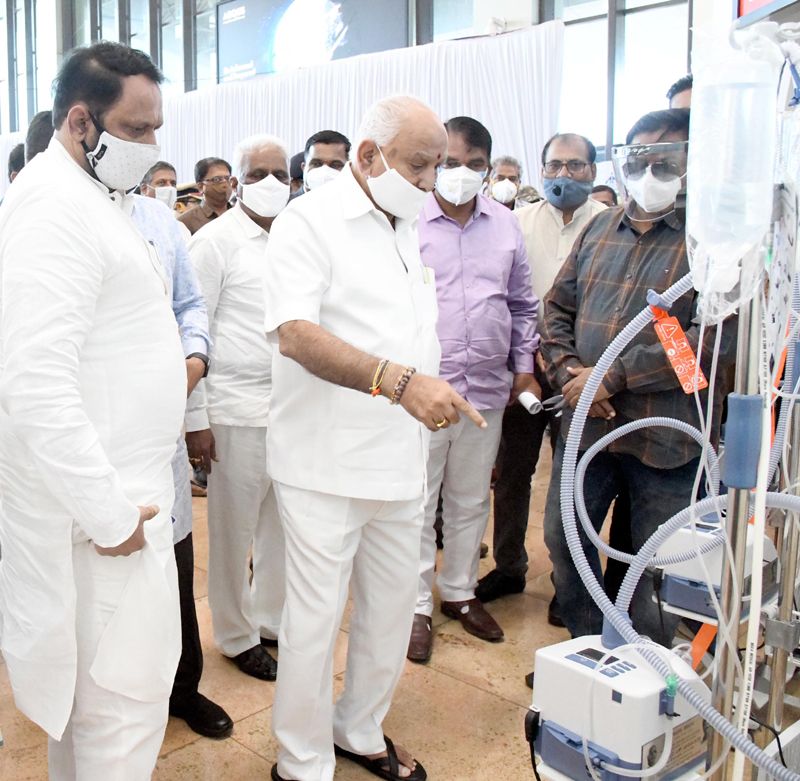 BIMS: Karnataka chief minister B S Yeddiyurappa hands over Oxigen instruments