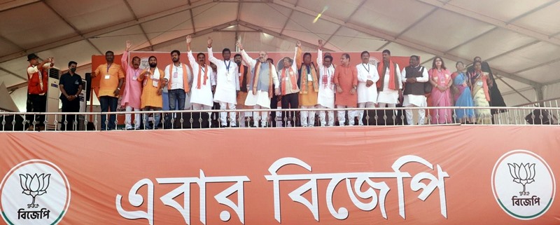 Amit Shah waves at the crowd in election rally in West Bengal