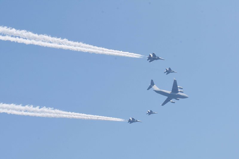 New Delhi: IAF Su-30, Mig-29 with C-17 Gobemaster fighter aircrafts performing a fly past during the 72nd Republic Day