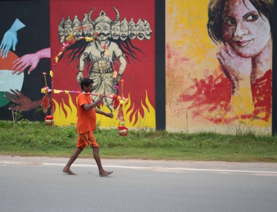Shrawan in Agartala: Kanwarias carrying containers of holy water