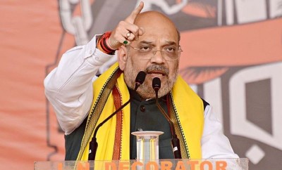 Seated on Badruddin Ajmal’s lap, Congress shamelessly talks about secularism: Amit Shah