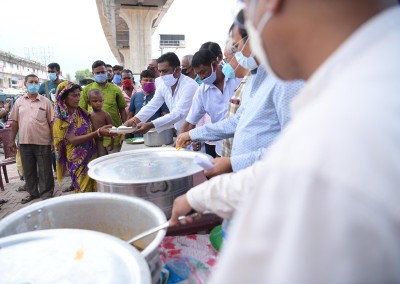 People waiting in queue for food in Agartala