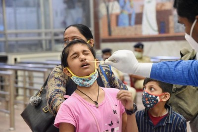 India records slight spike in COVID-19 cases, 497 people die