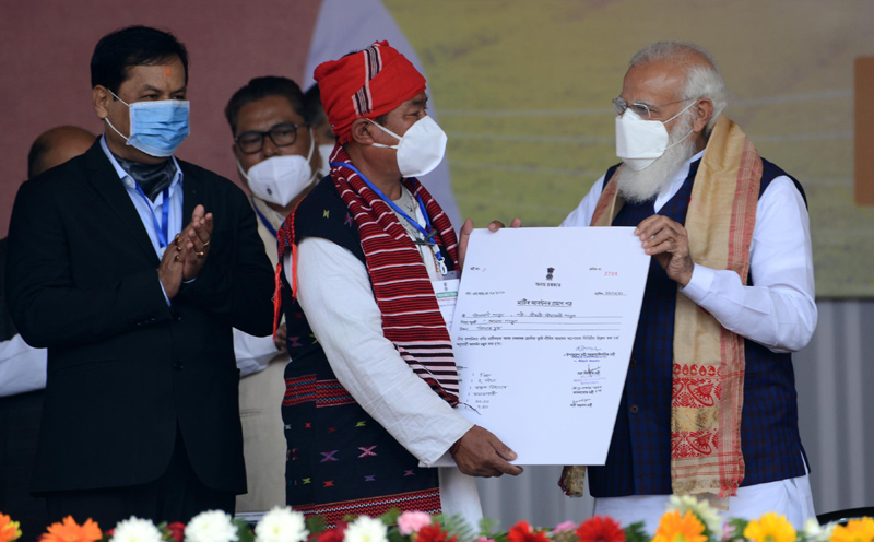 Assam: Naredra Modi distributes land patta to landless people during public meeting