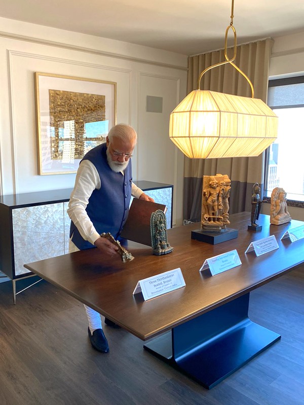 Glimpse of PM Modi reviewing artifacts and antiquities which he is bringing back to India from US