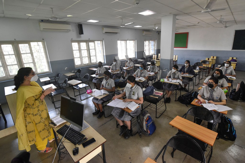 Glimpses of students attending physical classes in Kolkata as West Bengal schools reopen from today