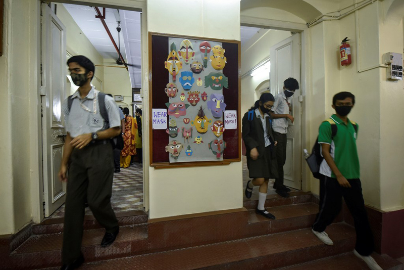 Glimpses of students attending physical classes in Kolkata as West Bengal schools reopen from today