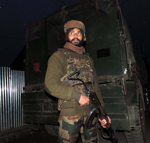 Security forces during an encounter at Gousu Hazratbal in Kashmir