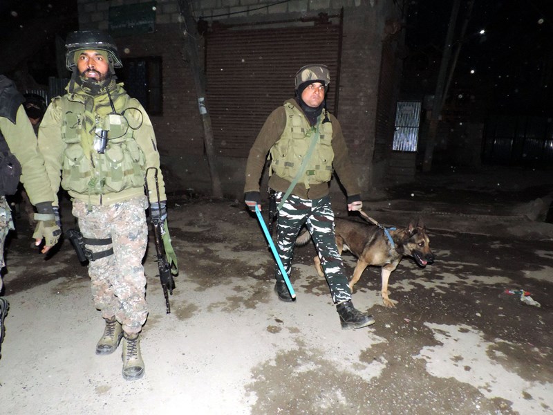Security forces during an encounter at Gousu Hazratbal in Kashmir