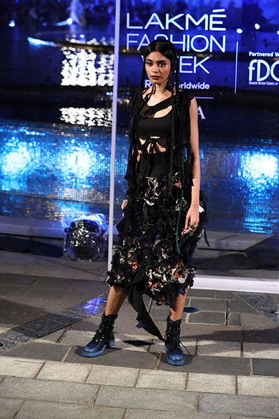 Models showcase designer Anamika Khanna's line of clothing at the Lakme Fashion Week